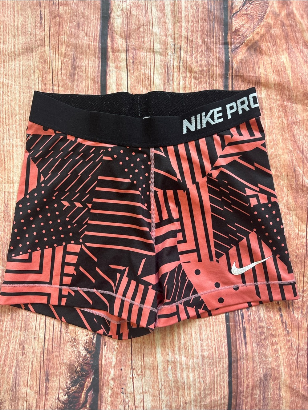 Nike Women's Black and Coral Geometric Bike Shorts